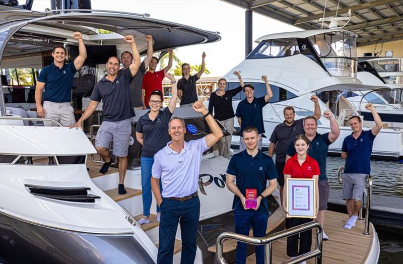 Riviera owner Rodney Longhurst celebrating the Premier of Queensland Export Awards win with representatives from across the Riviera 850-strong team photo copyright Riviera Australia taken at 