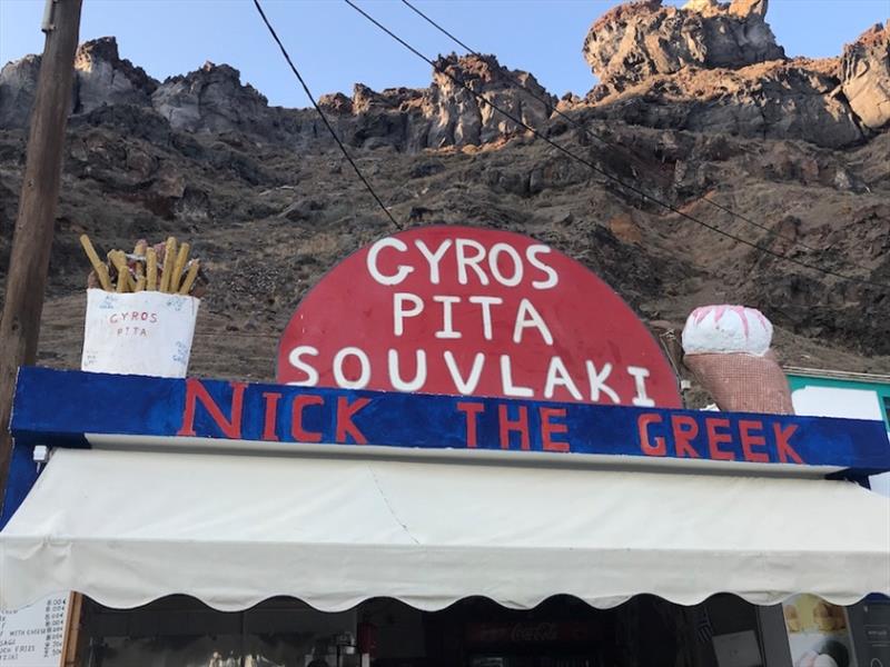 At the ferry dock on Thirasia, Phils perfect Greek meal a Gyros and ice cream photo copyright SV Red Roo taken at 