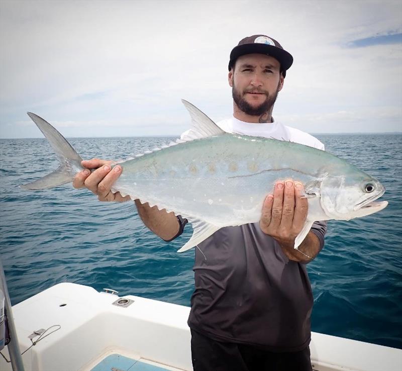 A bit of queenfish action during a charter with Fraser Guided Fishing. - photo © Fisho's Tackle World