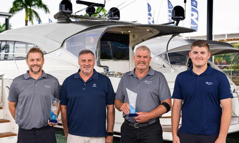 Riviera's Dealer and Owner Care Director Australasia, Steve Nolan (second from left), congratulates the R Marine Jones service team (from left) Ben Croft, Sharm Brown and Jack Jones for their 2021 award honours. - photo © Riviera Australia