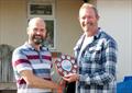 Commodore Neil Brookes (left) presenting Aran Pitter with his Trophy at the Sully Sailing Club Annual Regatta © Nigel Vick