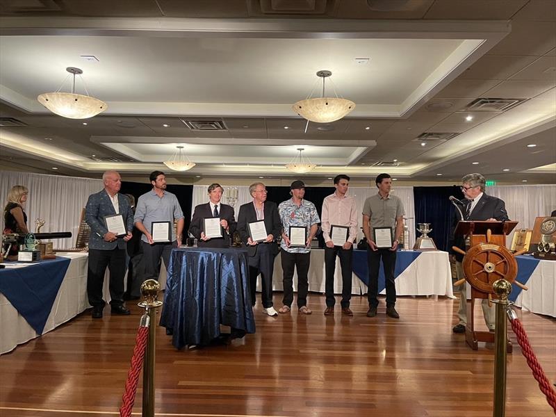 From left: Len Bose, Steven Natvig, Jamie Malm, John Shulze, Taylor Schlub, Kenneth Sherb, Chris Vilicich, and presenting the Hanson medal, Bruce Brown from the US Sailing Safety at Sea Committee photo copyright US Sailing taken at 