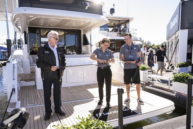 (L to R)  Long term employee Peter Ferrari joins award winning apprentices Zoe De Pryck and Jesse Blackley at the unveiling. photo copyright Maritimo taken at 