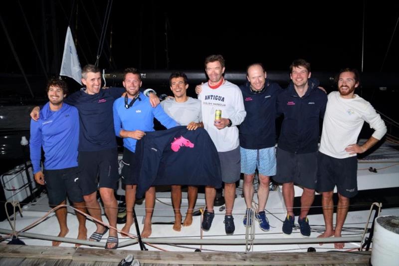 The crew of Dawn Treader enjoyed a cold Carib beer and warm welcome after their close finish - photo © Tim Wright / photoaction.com