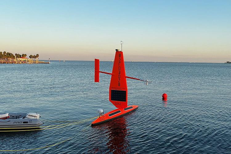 A 23-foot Saildrone Explorer awaits deployment off in front of Saildrone's new Ocean Mapping Operations Center in Florida photo copyright Saildrone taken at 