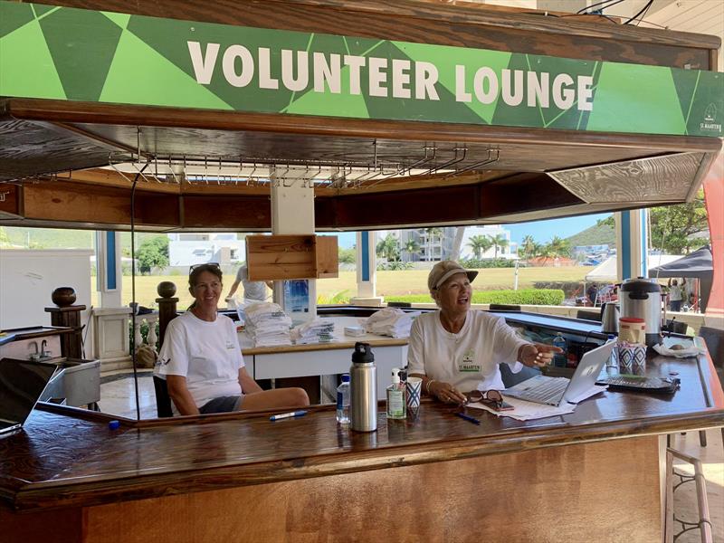 Jane Parisi (right) ran the all-important volunteer bar. She has been involved for many years, including her husband, Toni, who has ran the water taxi service for decades - photo © St. Maarten Heineken Regatta