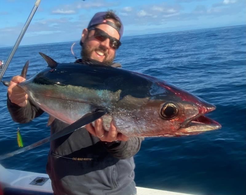 Phil Ellerton with a sizeable Albie caught at Cape Roul. - photo © Spot On Fishing Hobart