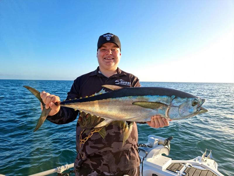 Caleb with a nice longtail too - photo © Fisho's Tackle World