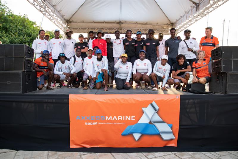 Opportunity knocks for young sailors racing on Axxess Marine Y2K Race Day at Antigua Sailing Week - Founder of Axxess Marine, Dennis Henri, together with Andrea Carmichael, COO of Axxess Marine was on the stage photo copyright Ted Martin taken at Antigua Yacht Club