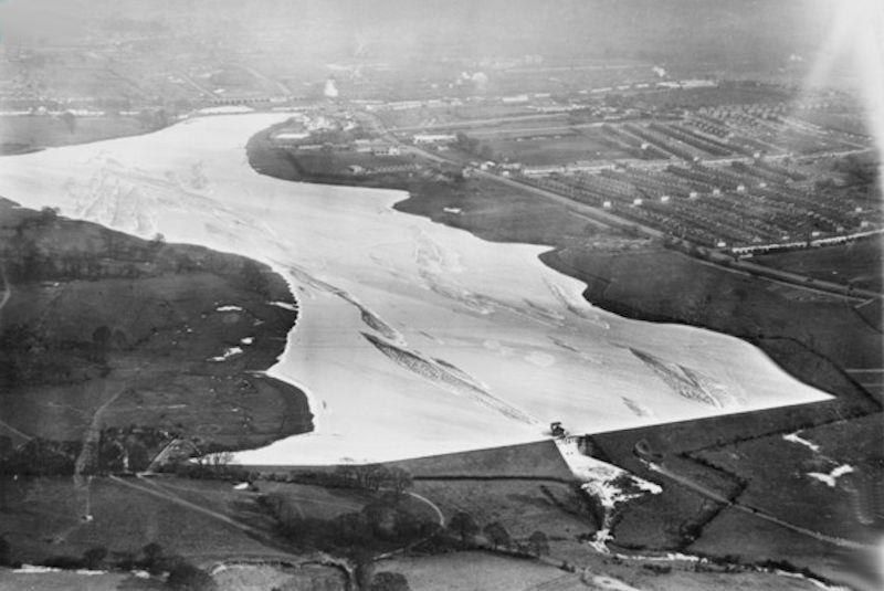 London's Welsh Harp reservoir (Wembley) became a natural skating rink in the cold winters of the 1930s photo copyright Historic England taken at Wembley Sailing Club
