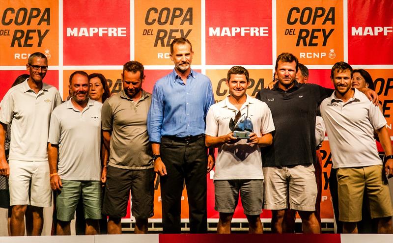 Jason Carroll (third from the right) and his Argo crew collect their Copa del Rey MAPFRE trophy from King Felipe VI of Spain.  - photo © Sailing Energy / GC32 Racing Tour