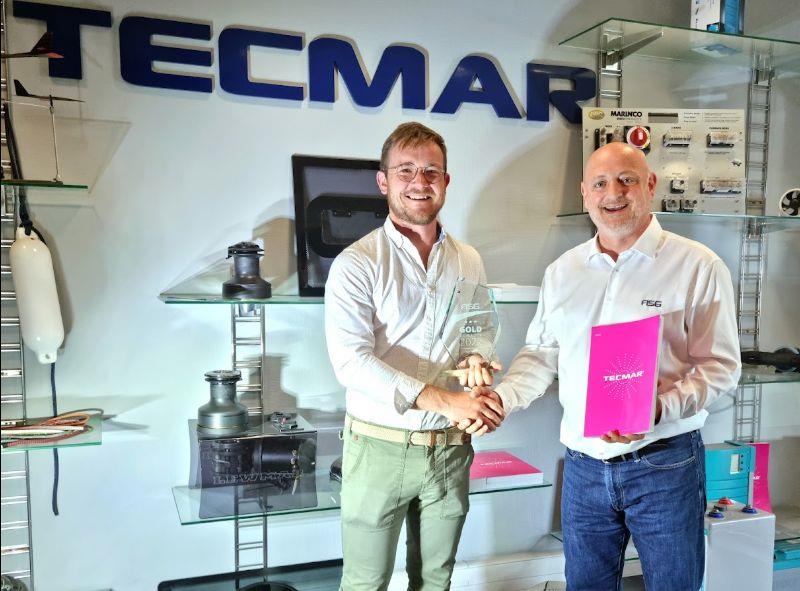 Jean-Yves Burdy, Aftermarket sales manager France (ASG Group) gives the Gold Distributor trophy to Martin Lambot, Purchasing Manager (Tecmar) on Tuesday, May 31, 2022 at Tecmar's headquarters in La Rochelle - France photo copyright Tecmar taken at 