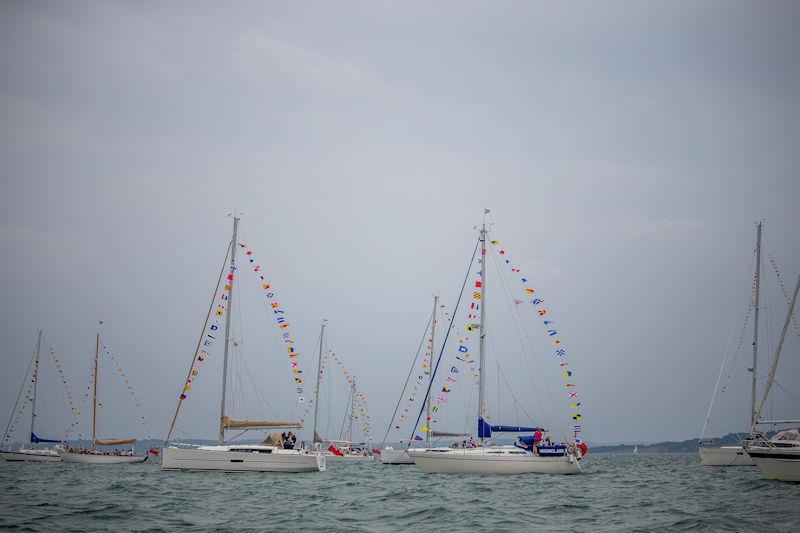 Part of the spectacular line up of members' yachts dressed overall in nautical flags on anchor awaiting the Fleet Review by HRH The Princess Royal - photo © Sportography