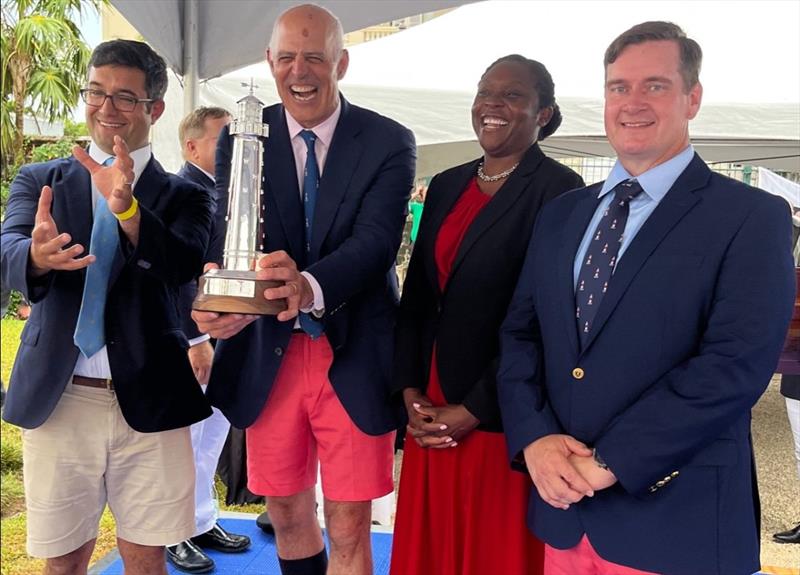 Receiving the Gibbs Hill Lighthouse Trophy, Charles Swans, Chris Sheehan, Chris Lewis. - photo © Trixie Wadson