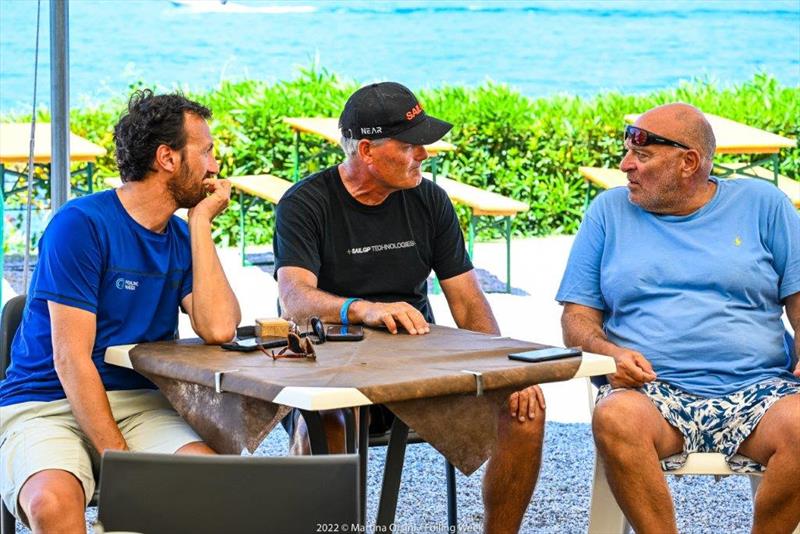 From the left: Luca Rizzotti, Founder and President of FOILING WEEK, Russell Coutts, gold medalist in the Finn class at the 1984 Los Angeles Olympics and winner of 5 America's Cup, Luca Devoti, silver medalist in the Finn class at the 2000 Sydney Olympics photo copyright Martina Orsini / Foiling Week taken at Fraglia Vela Malcesine