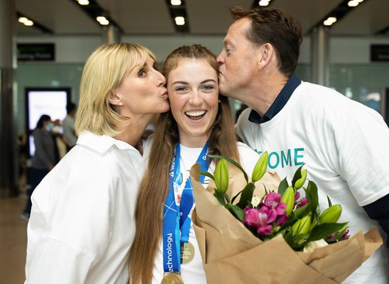 Triple gold medalist Eve McMahon and Irish Academy sailors welcomed at Dublin Airport - photo © INPHO / Tom Maher