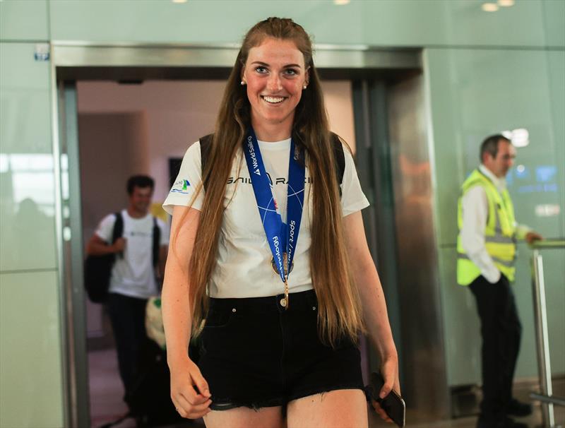 Triple gold medalist Eve McMahon and Irish Academy sailors welcomed at Dublin Airport - photo © INPHO / Tom Maher