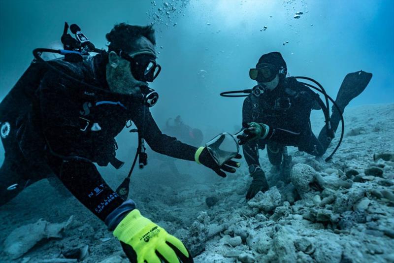 Allen (pictured below in the yellow gloves) is an avid diver photo copyright Damen Yachting taken at 