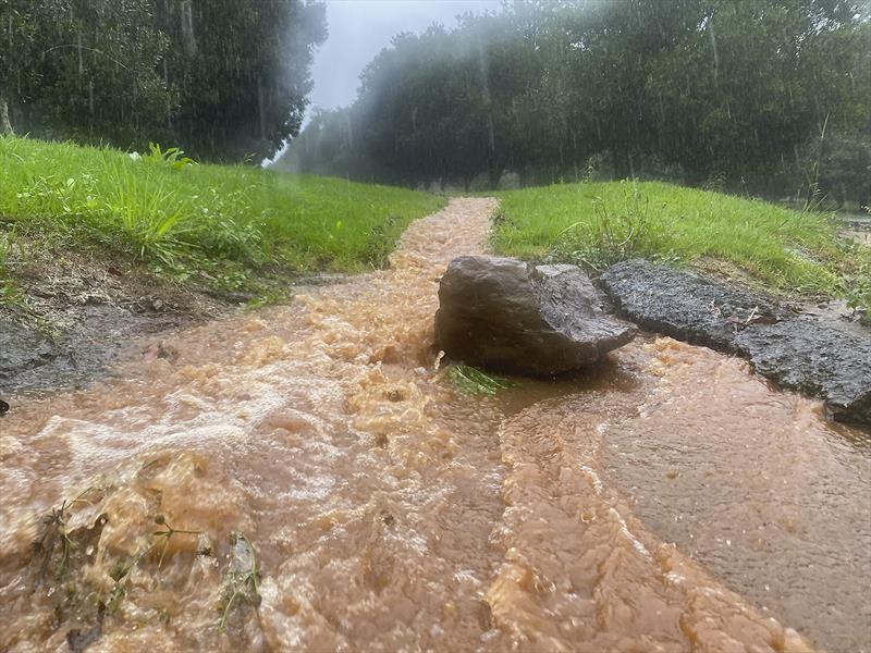 Playing with water. A trickle always becomes a stream, and its power grows with it photo copyright John Curnow taken at 