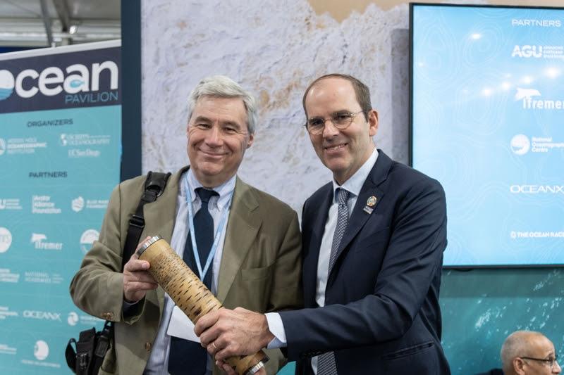 Richard Brisus, Race Chairman, The Ocean Race, passes the Nature's Baton to US Senator Sheldon Whitehouse at the Ocean Pavilion at COP27 - photo © Cherie Bridges / The Ocean Race