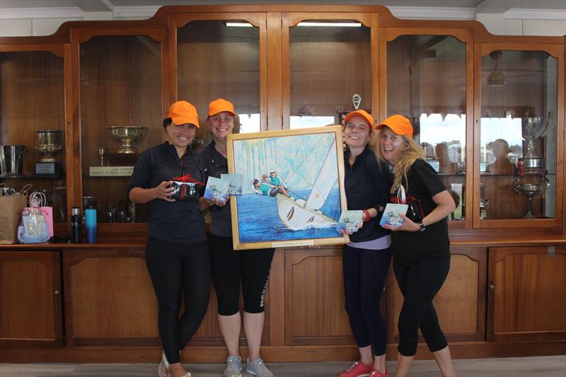 2023 MWKR winners, Team Orange. L to R: Jasmine Mudie, Kristie Hatch, Tanya Kelly (helm) and Lea Van Dijk with the perpetual trophy, a painting by Amanda Davidson photo copyright Mark Dowsett taken at Mooloolaba Yacht Club