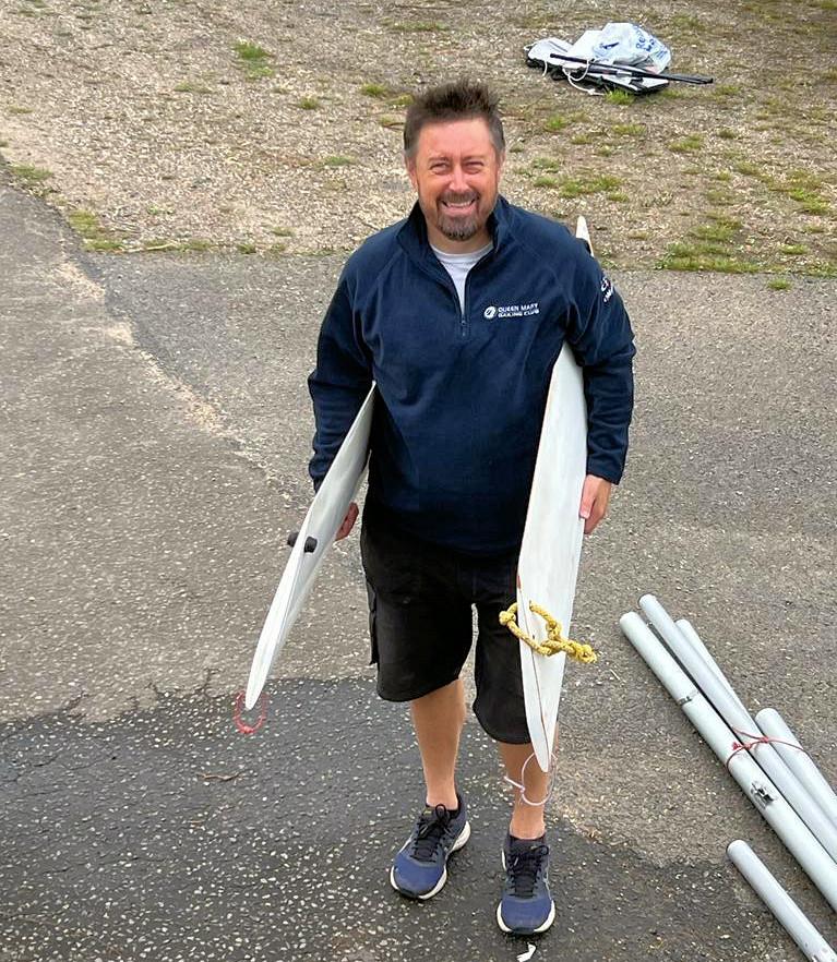 Tony Bishop with a pair of ILCA daggerboards photo copyright QMSC taken at Queen Mary Sailing Club