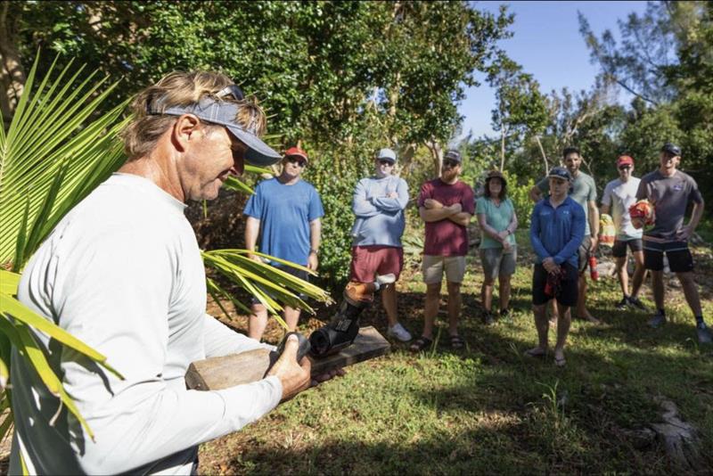 JP Skinner, the founder and director of Waterstart, shows competitors from the Bermuda Gold Cup a trap used to catch rodents on on Burt Island photo copyright Ian Roman / WMRT taken at Royal Bermuda Yacht Club