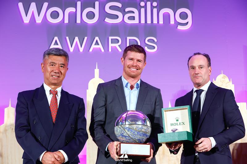 World Sailing President Quanhai Li presents Tom Slingsby, Rolex World Sailor of the Year - Male with Lionel Schurch, Rolex Communication and Image Executive at the World Sailing Awards , Malaga, Spain on 14th November - photo © Mark Lloyd / World Sailing Free Editorial Rights