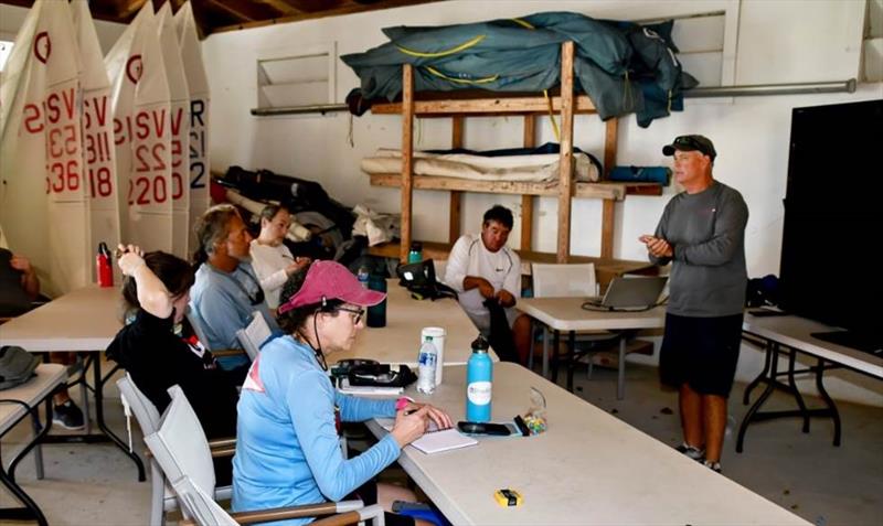 Shoreside debrief led by Bobby Brown (far right), STSC director photo copyright Dean Barnes taken at St. Thomas Yacht Club