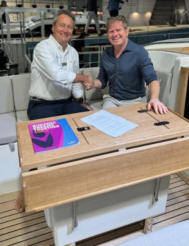 Signing the agreement photo copyright Windcraft Yachts taken at 