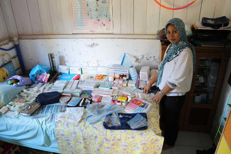 A Midwife receives supplies from S/V Vega photo copyright Shane Granger taken at 