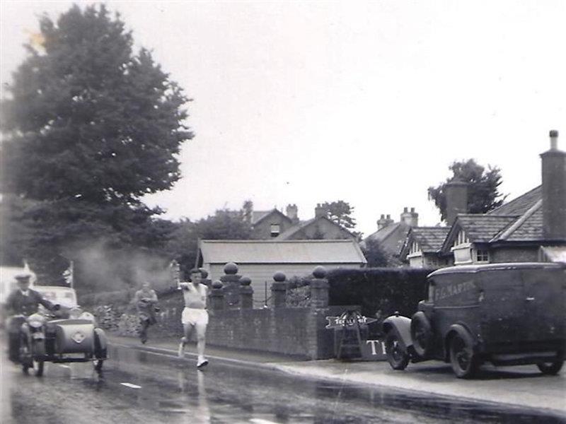 The Olympic Torch was carried from London down to Torquay but the later stages for the relay of runners was marked by heavy rain - photo © Torquay Library