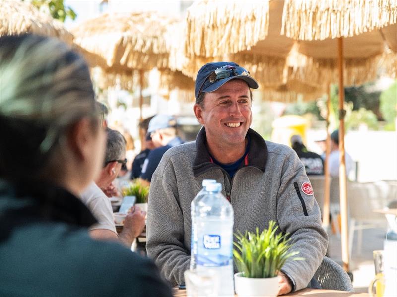 USST ILCA 6 Coach Alex Saldanha taking time with USST ILCA 6 Athlete Charlotte Rose to get some shade and stay hydrated at a nearby cafe during a postponement photo copyright US Sailing Team taken at Real Club Náutico de Palma