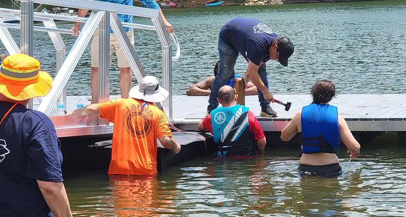 Union Sportsmen's Alliance union volunteers and USACE staff installing the new floating dock on Lake Allatoona photo copyright Union Sportsmen's Alliance taken at 
