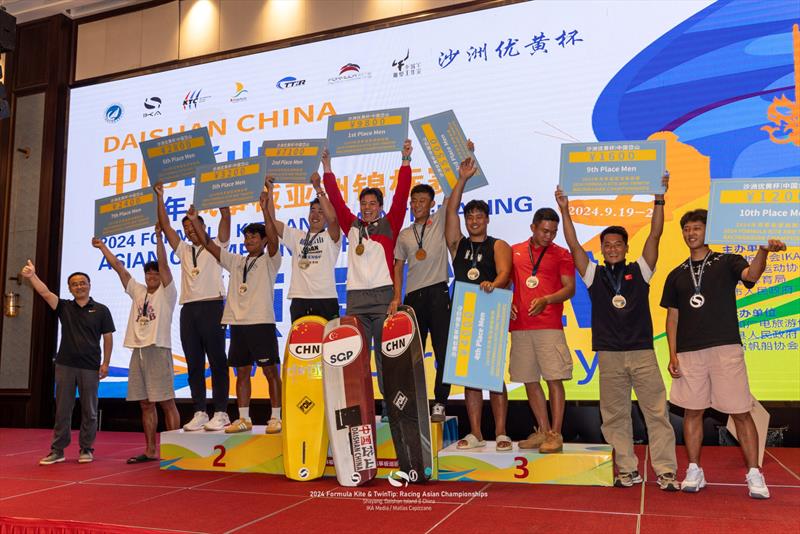 Prizegiving ceremony in true Chinese style! - 2024 Kiteboarding Asian Championships photo copyright IKA Media / Matias Capizzano taken at 