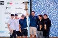 Beaming with joy at the top three of the Kieler Woche in the 49er from France (center), Germany (left) and Uruguay © Sascha Klahn