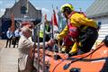 His Majesty meeting RNLI volunteers during a simulated rescue at Walmer