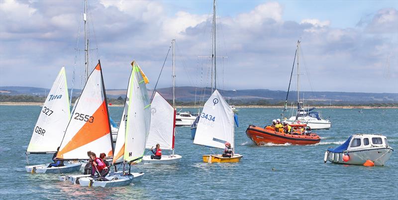 Hayling's Atlantic 85 lifeboat heads towards the sailing club amongst the junior sailors during the Mengeham Rythe Sailing Club 75th Anniversary Celebrations photo copyright Cat Dawtrey taken at Mengeham Rythe Sailing Club