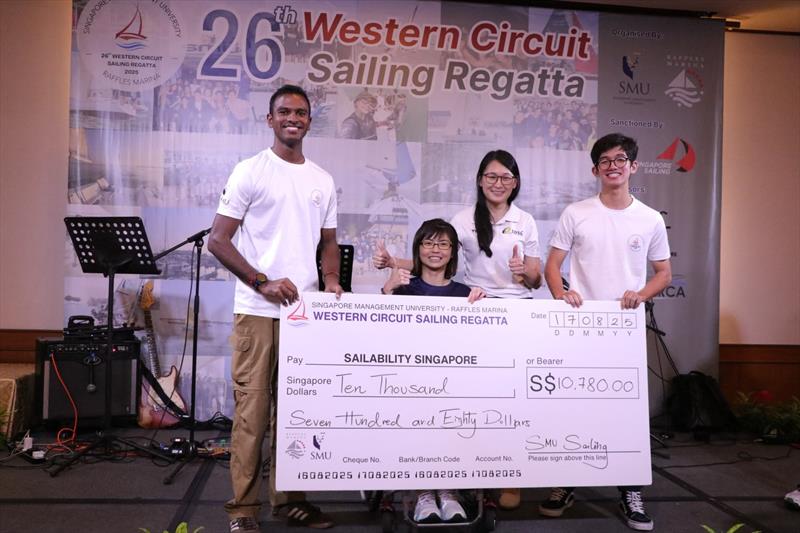 Presentation of cheque to Sailability Singapore - photo © Howie Choo