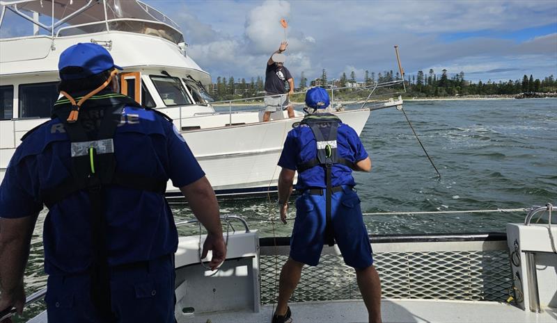 PM 30 crews assist the stricken skipper photo copyright Marine Rescue NSW taken at 