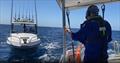 Volunteers from Marine Rescue Bermagui assist three anglers stranded offshore