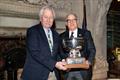 Jim Capron, left, with trophy presenter and US Sailing Board President Henry Brauer