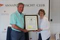 Paul `Bo` Bollinger, CRAB President & CEO, receives the Adaptive Boating Month Proclamation from Secretary Carol Beatty &copy; CRAB Sailing