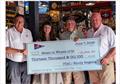From left: IYAC Co-Owner and Rhody Regatta Event Chair Mick Harvey, Meals On Wheels External Affairs Coordinator Wetherley Hundley, Committee Member Steve Eddleston, and IYAC Co-Owner/Committee Member Pat Kennedy &copy; Barby MacGowan