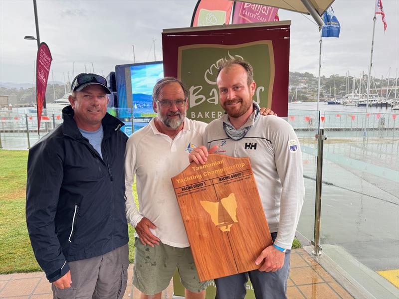 BYC Vice Commodore Troy Grafton presents the Tasmanian Yachting Championship to ORC winner Ian Stewart (Joint Custody) and to IRC winner Malo Leseigneur (Eye Candy) photo copyright Jane Austin taken at Bellerive Yacht Club