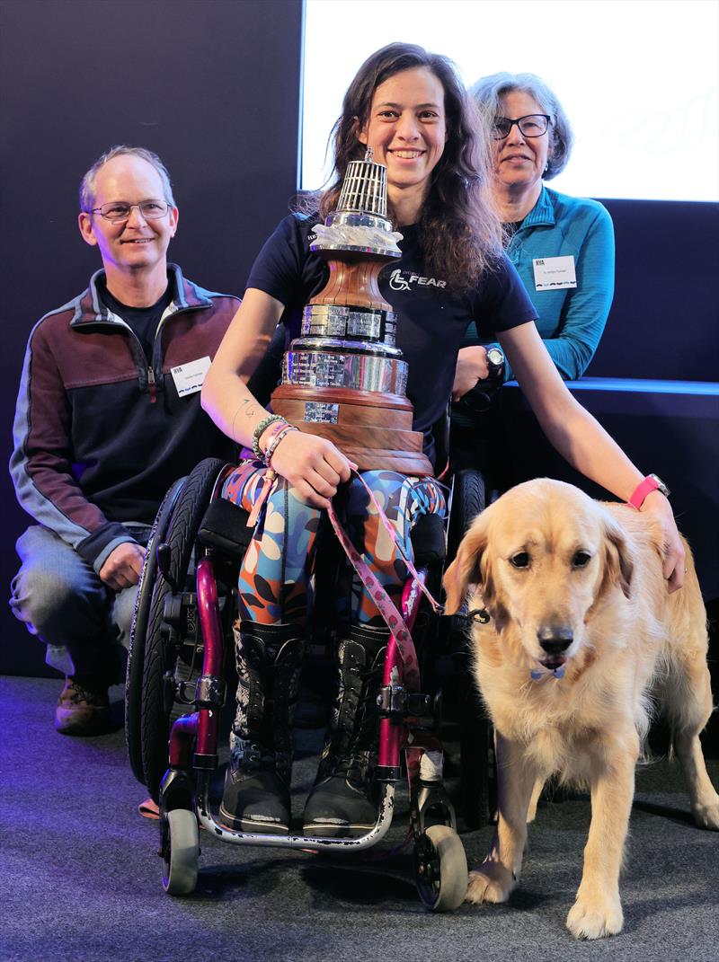 Jazz Turner, YJA Yachtsman of the Year 2025, with her family and Poppy photo copyright Mark Jardine / YJA taken at RYA Dinghy Show
