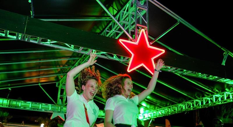 46th St. Maarten Heineken Regatta Day 1 - Sailors soak up the Regatta Village vibes, here enjoying Karma Killswitch Band rocking out - photo © Ramsay Soemanta