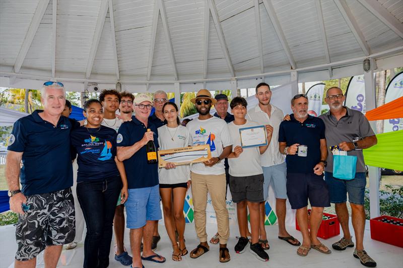 Minister of Tourism, Civil Aviation and Sustainable Development - Hon. Dr. Kishore Shallow (6th from right) with Sailors during prize Giving Ceremony - photo © SVG Sailing Week