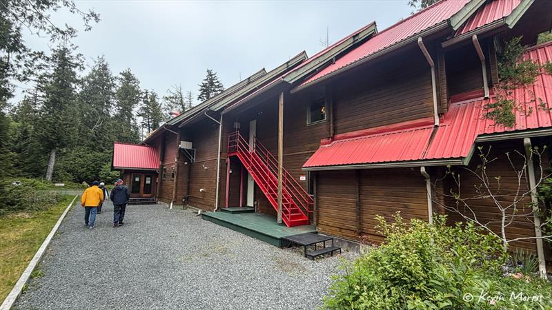 Walking past the Hakai accommodations building on the way to West Beach - photo © Kevin Morris
