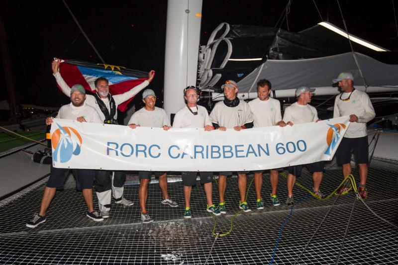 Team Phaedo celebrating their record breaking race dockside after the RORC Caribbean 600 photo copyright RORC / Tim Wright taken at Antigua Yacht Club and featuring the MOD70 class